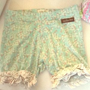 Floral, ruffled bottom MJ shorts.